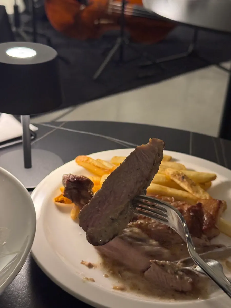 Well-done pork steak with sauce