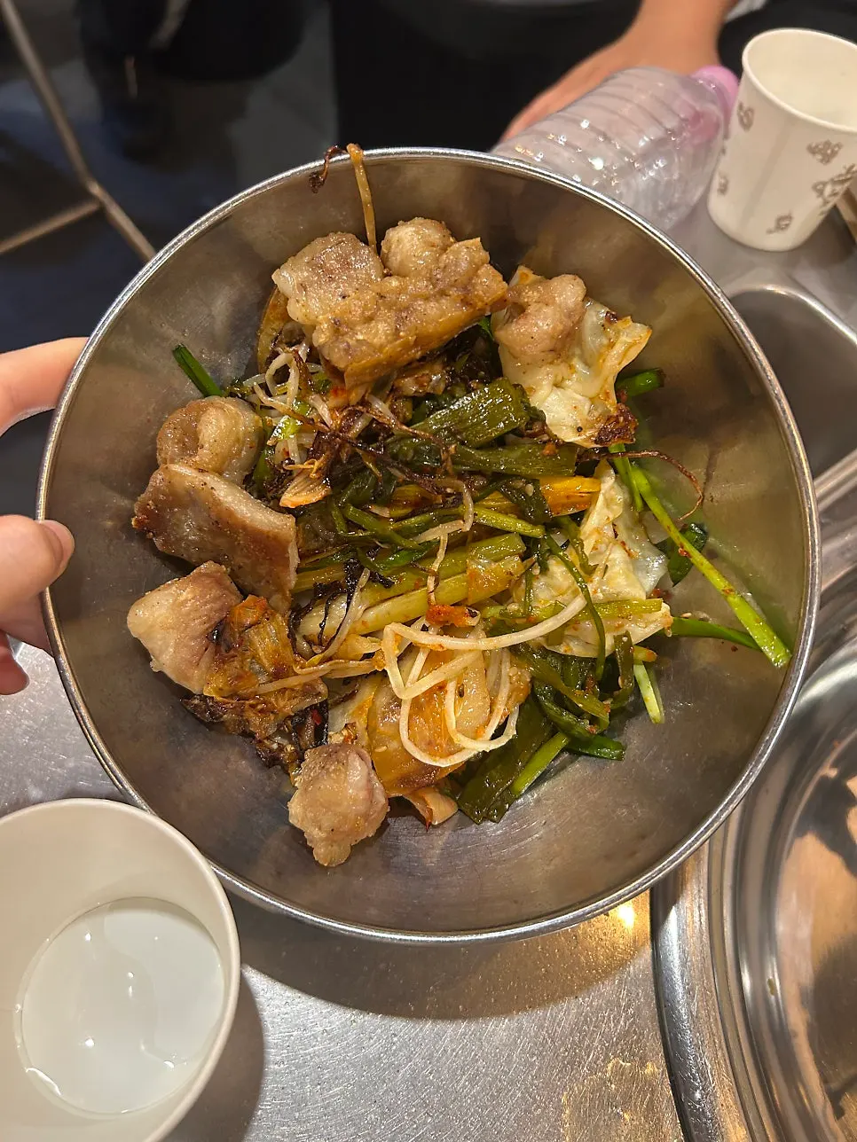 Gopchang dipped in mijeolma sauce
