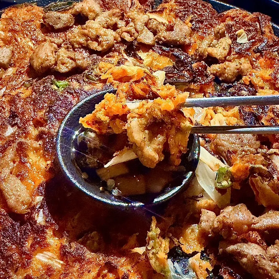 A plate of spicy bulgogi kimchi jeon