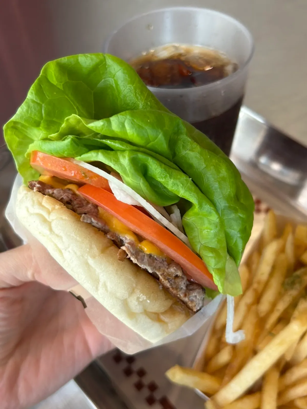 Cross-section of the Bas Burger with beef patty and vegetables