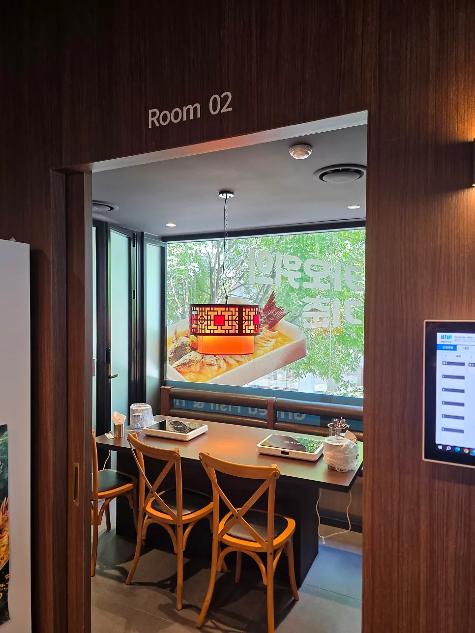 Amenity corner with chargers and hair ties for guests
