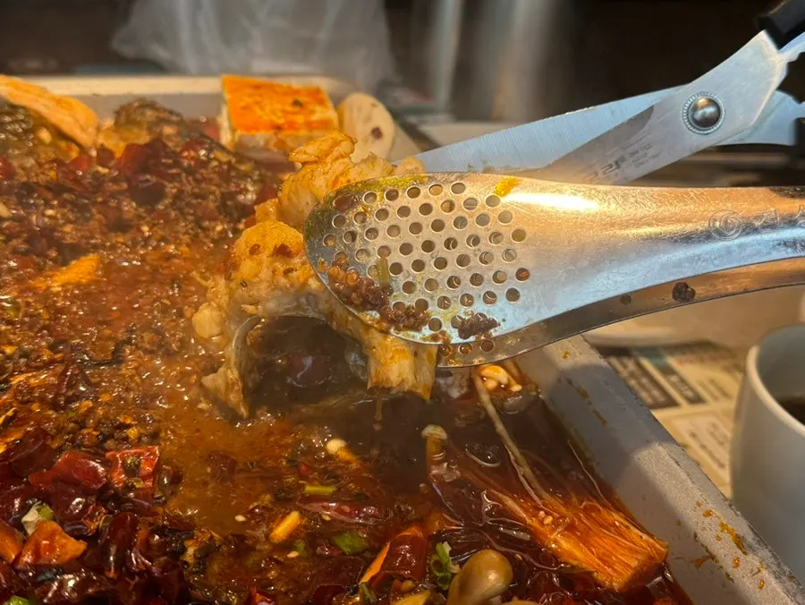 Pan filled to the brim after adding toppings
