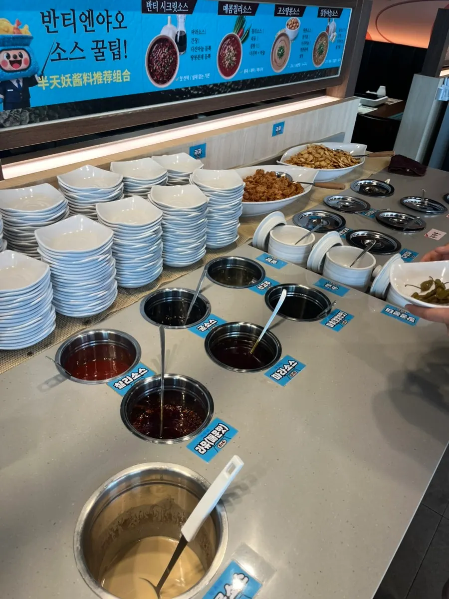 Unlimited-refill self-bar station in the middle of the hall