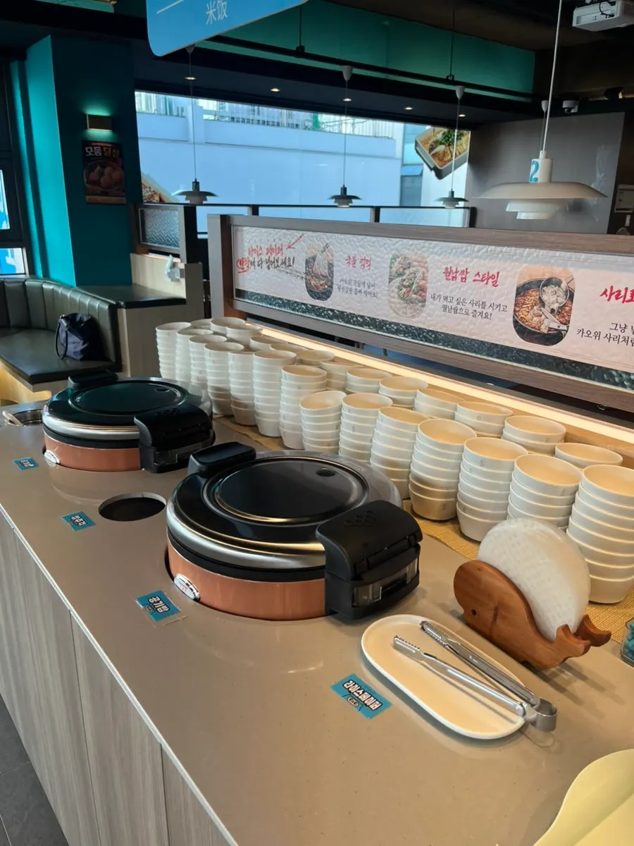 Rice cooker and white rice at the self-bar