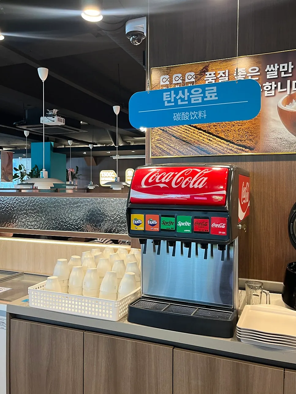Overview of the self bar with drinks and sauces