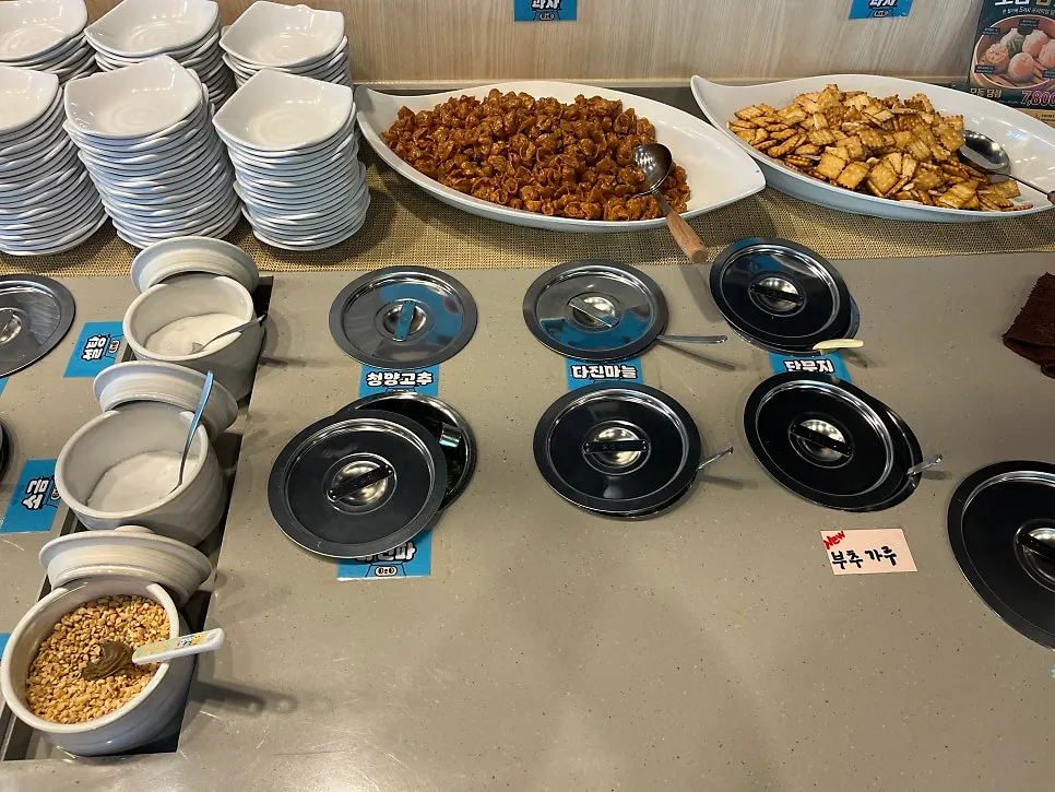 Various sauce containers at the sauce bar
