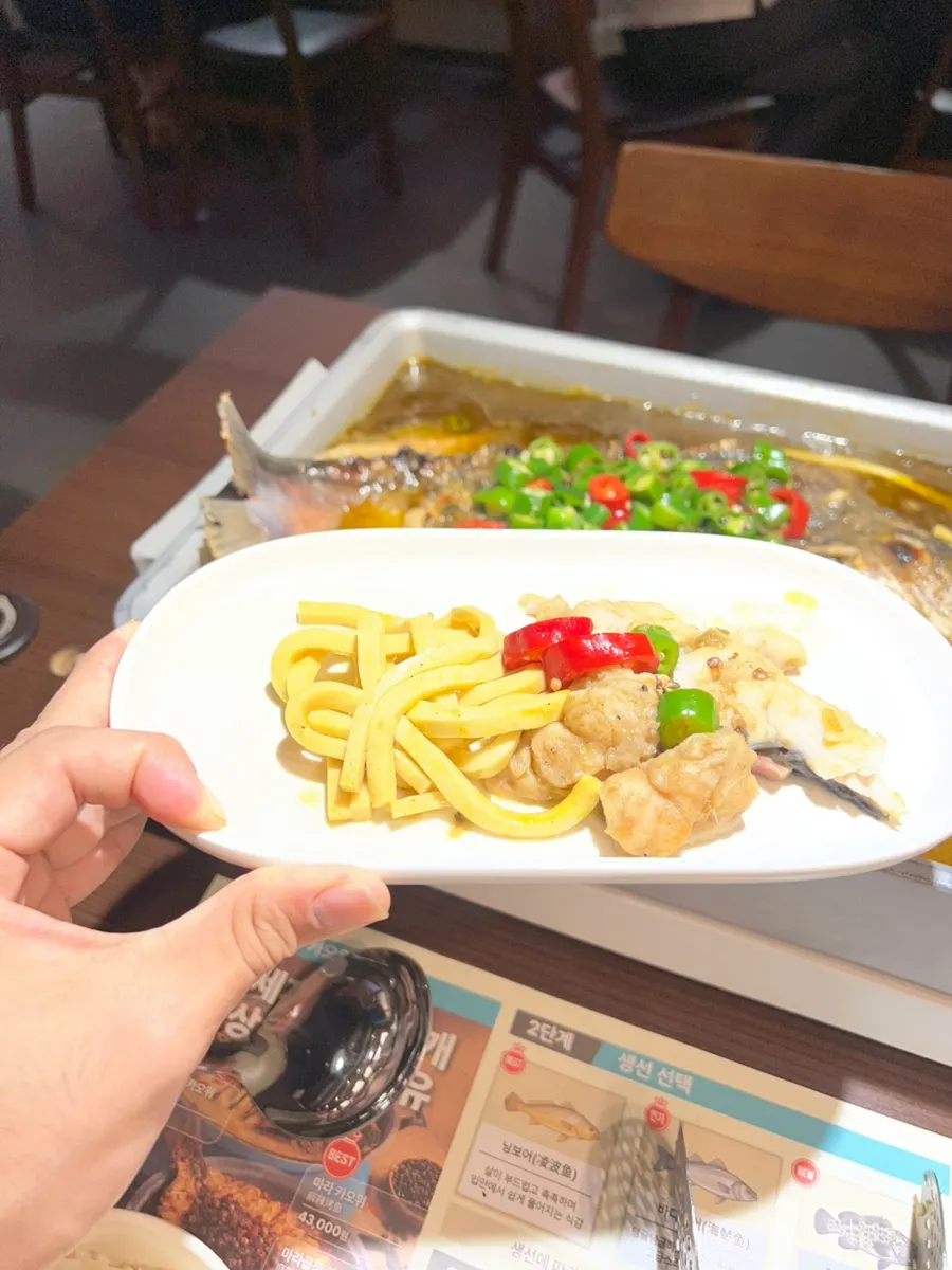 Qinghuajiao kaoyu fish served on a small plate