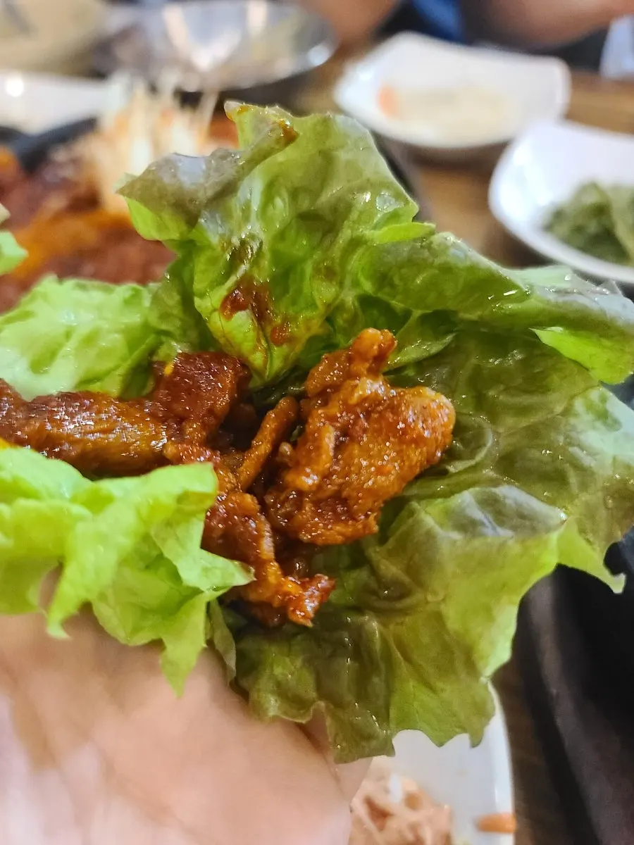 Spicy pork sizzling on the hot plate