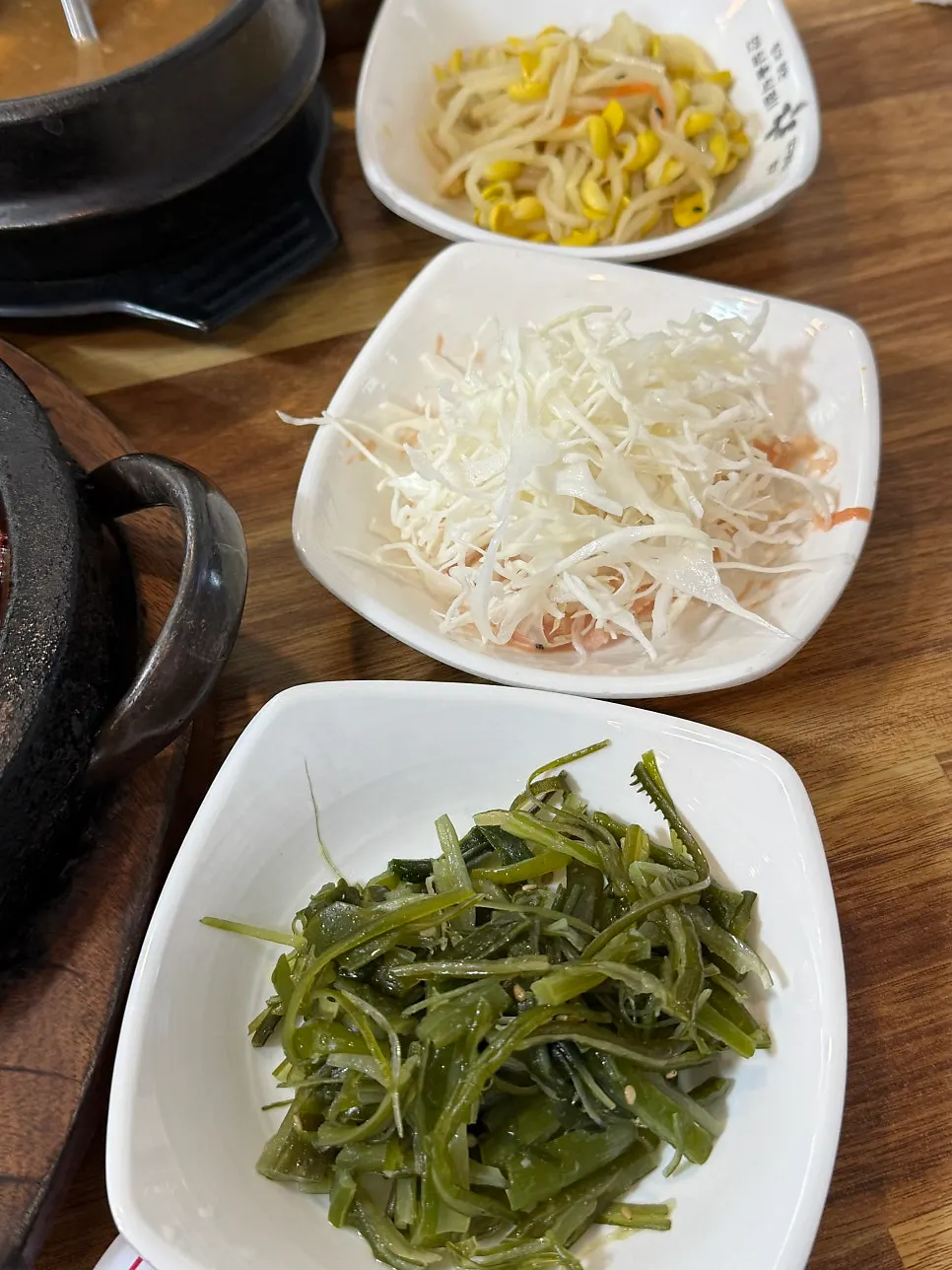Refilled side dish of seasoned greens