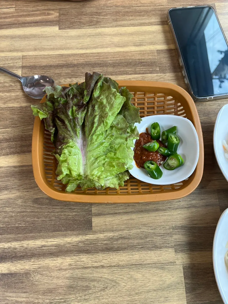 A plate of ssam vegetables and peppers