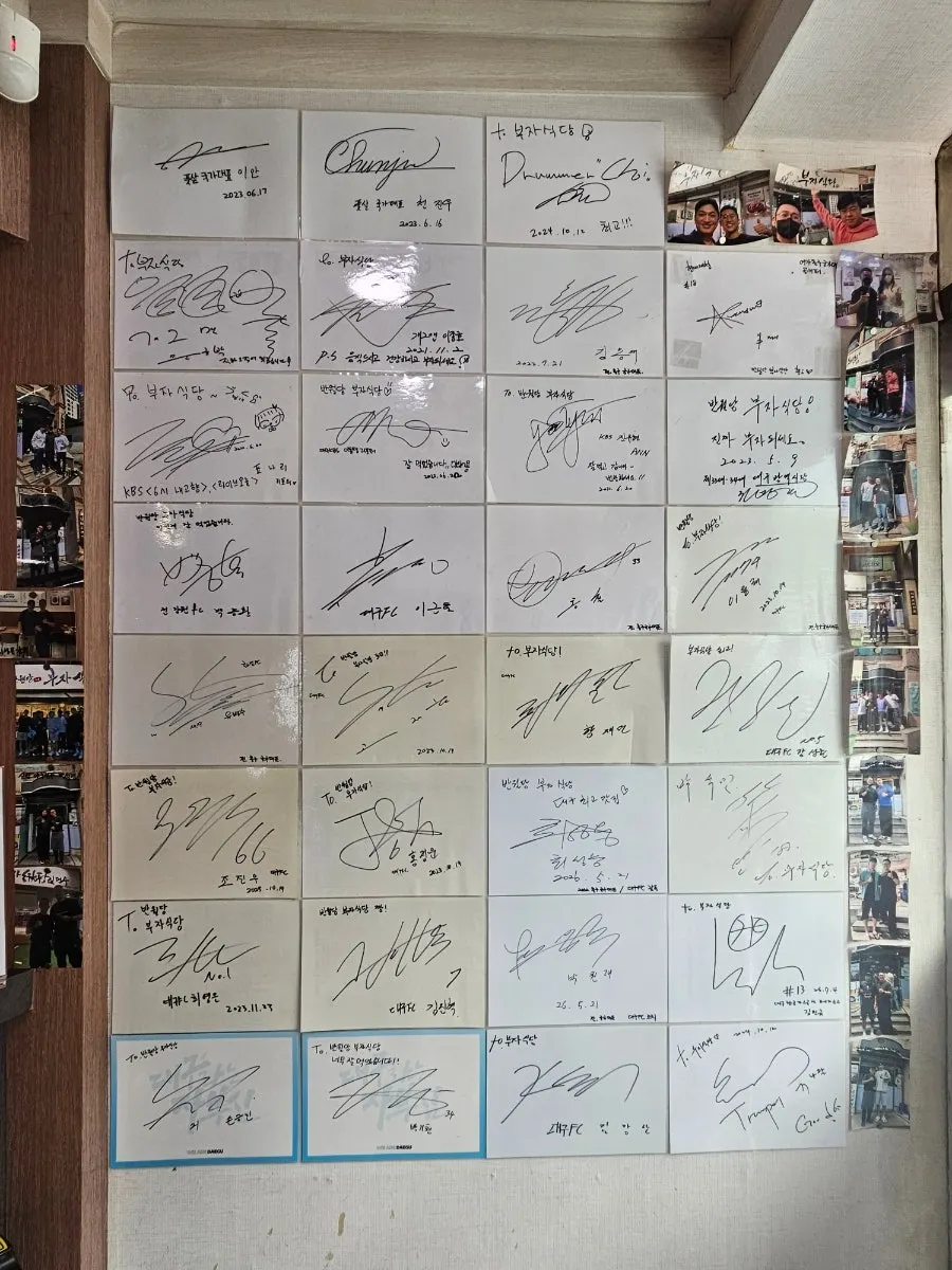 Restaurant wall covered with celebrity autographs