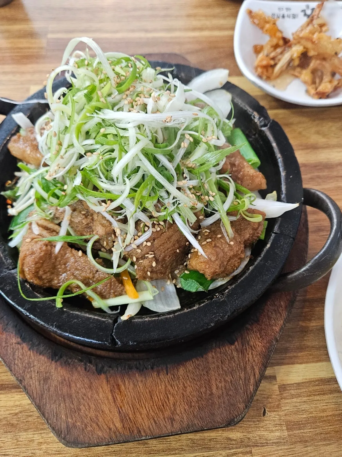 Stone-grilled rib served on a hot plate at Banwoldang Bujasikdang