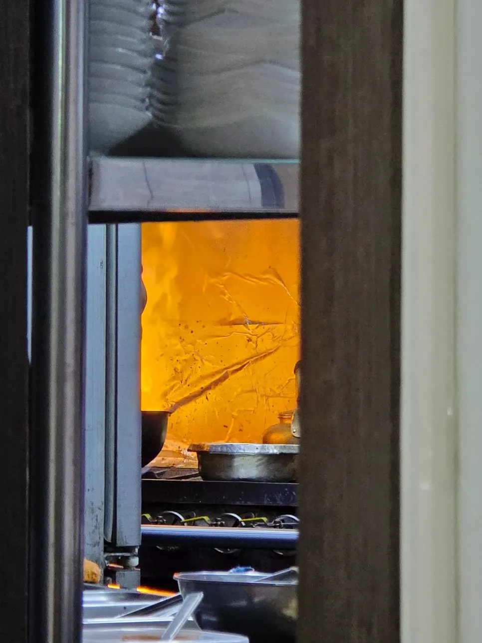 Fire show visible through the kitchen pass-through