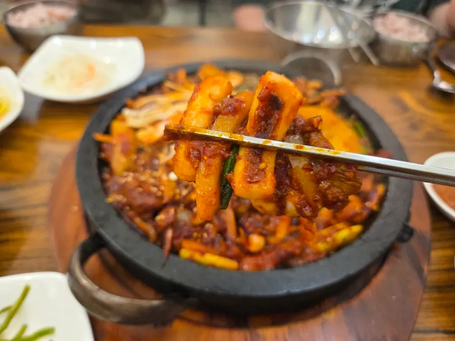 Squid and pork stir-fried together on the stone plate