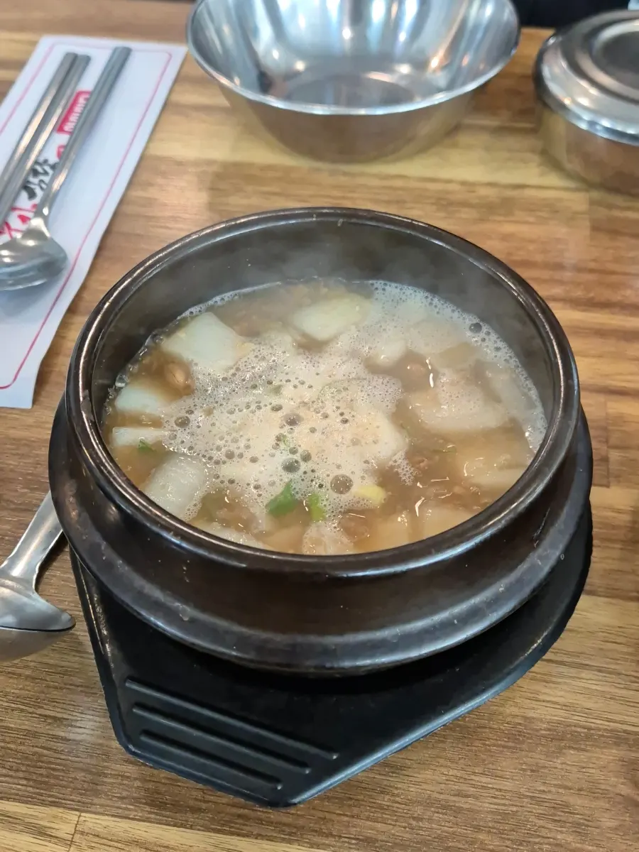 Side dishes of bean sprouts and radish