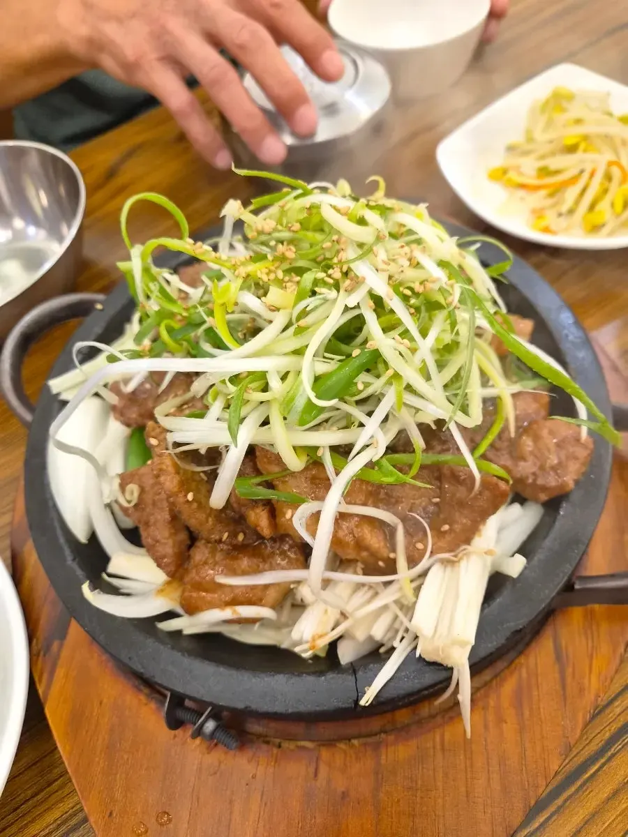 Seokgalbi and bibimbap spread at Banwoldang Buja Sikdang Suseong Branch