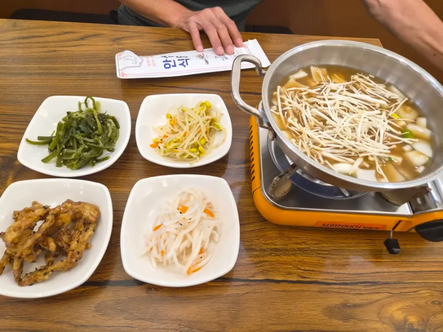 Table set with basic side dishes after ordering