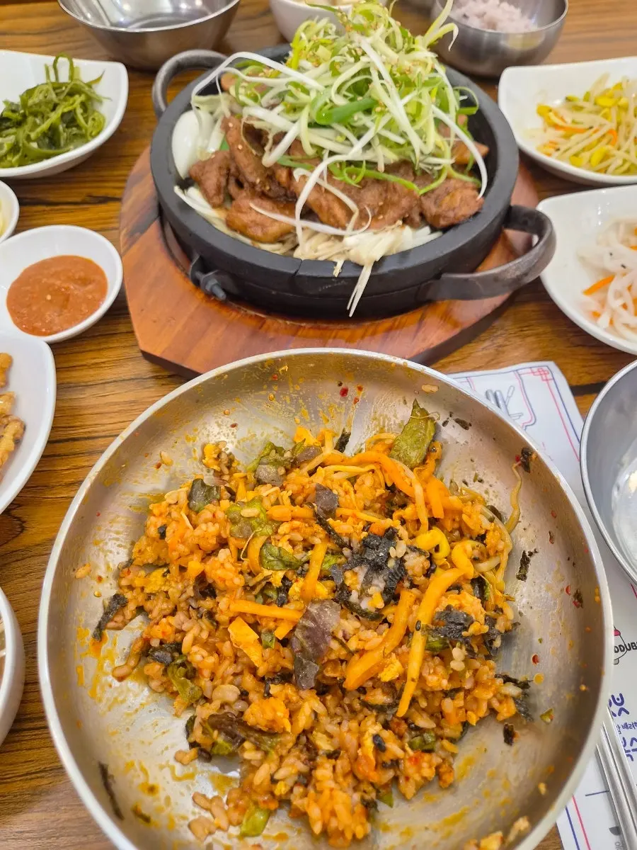 Gochujang chili paste added onto the bibimbap