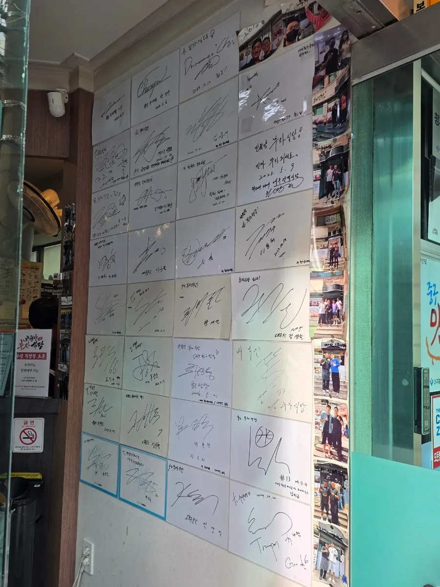 Signed papers on the entrance wall