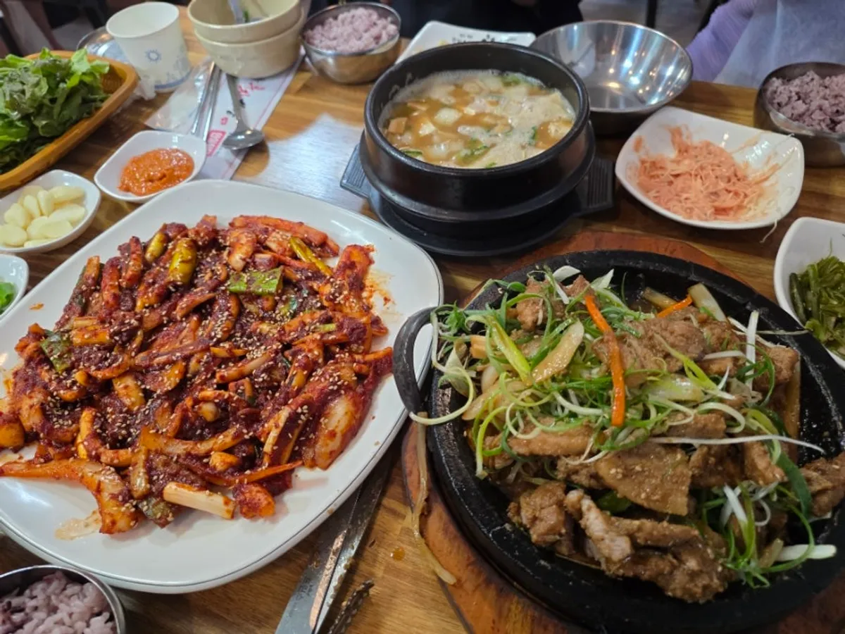 Grilled short rib and fire-grilled squid stir-fry spread