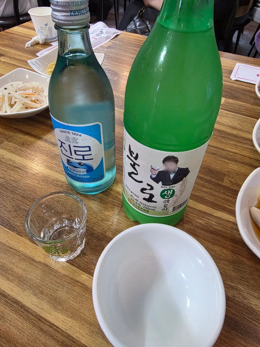 Table with Bullo makgeolli and Jinro soju