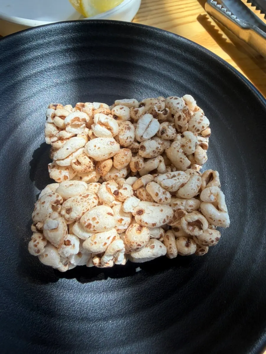 Grilled jjukkumi wrapped in roasted seaweed