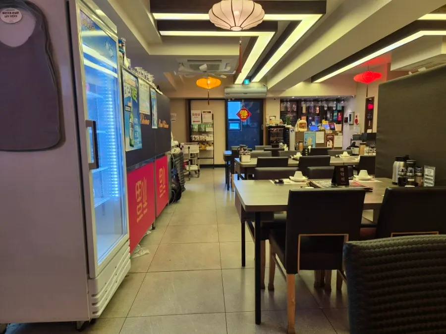 Hall seating with generous table spacing at the Chinese restaurant