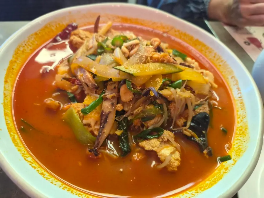 Close-up of the algoni jjamppong broth and ingredients
