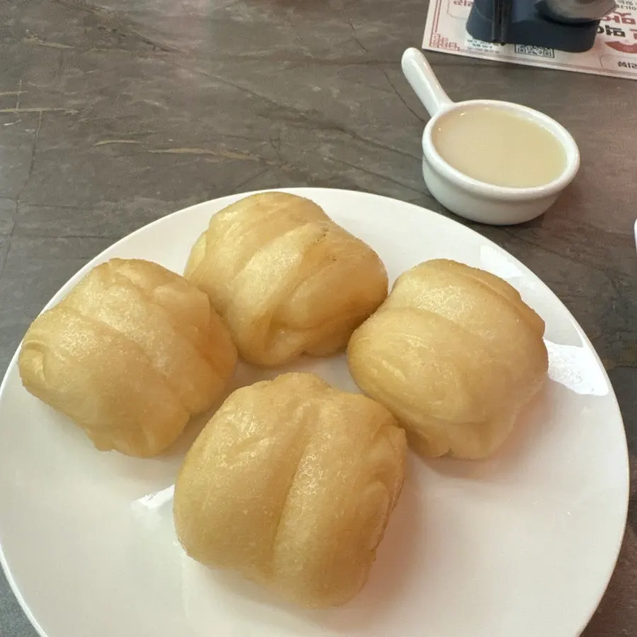 Fried flower bread served with condensed milk