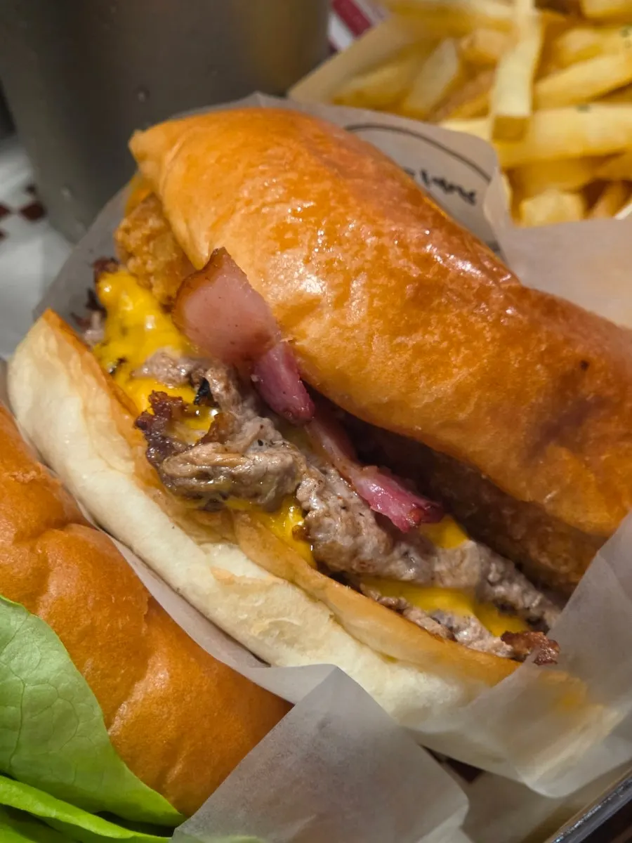 Double Bacon Cheese Burger with two slices of cheddar cheese and bacon