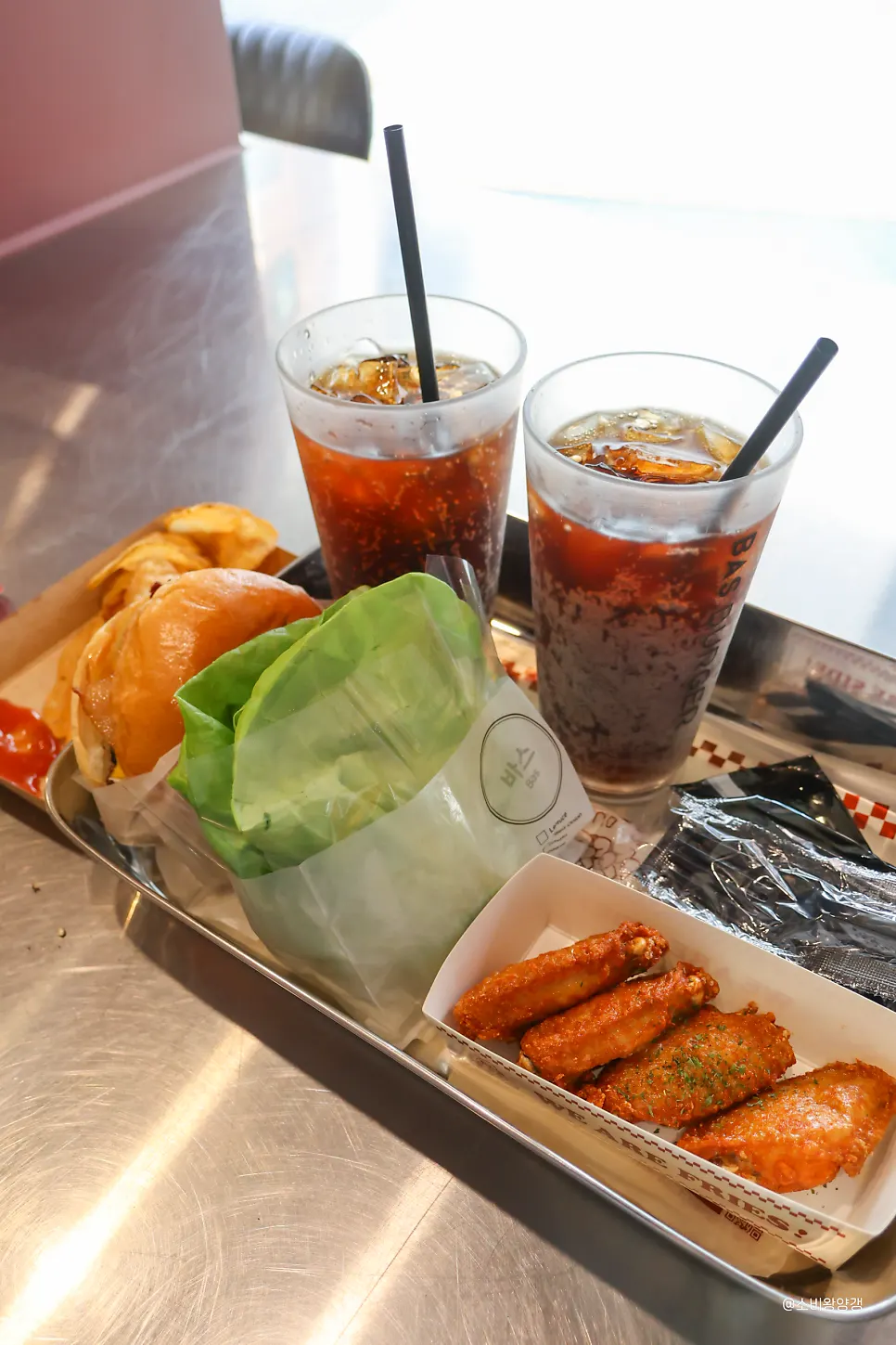 Two Bas Burger sets and wings ordered together