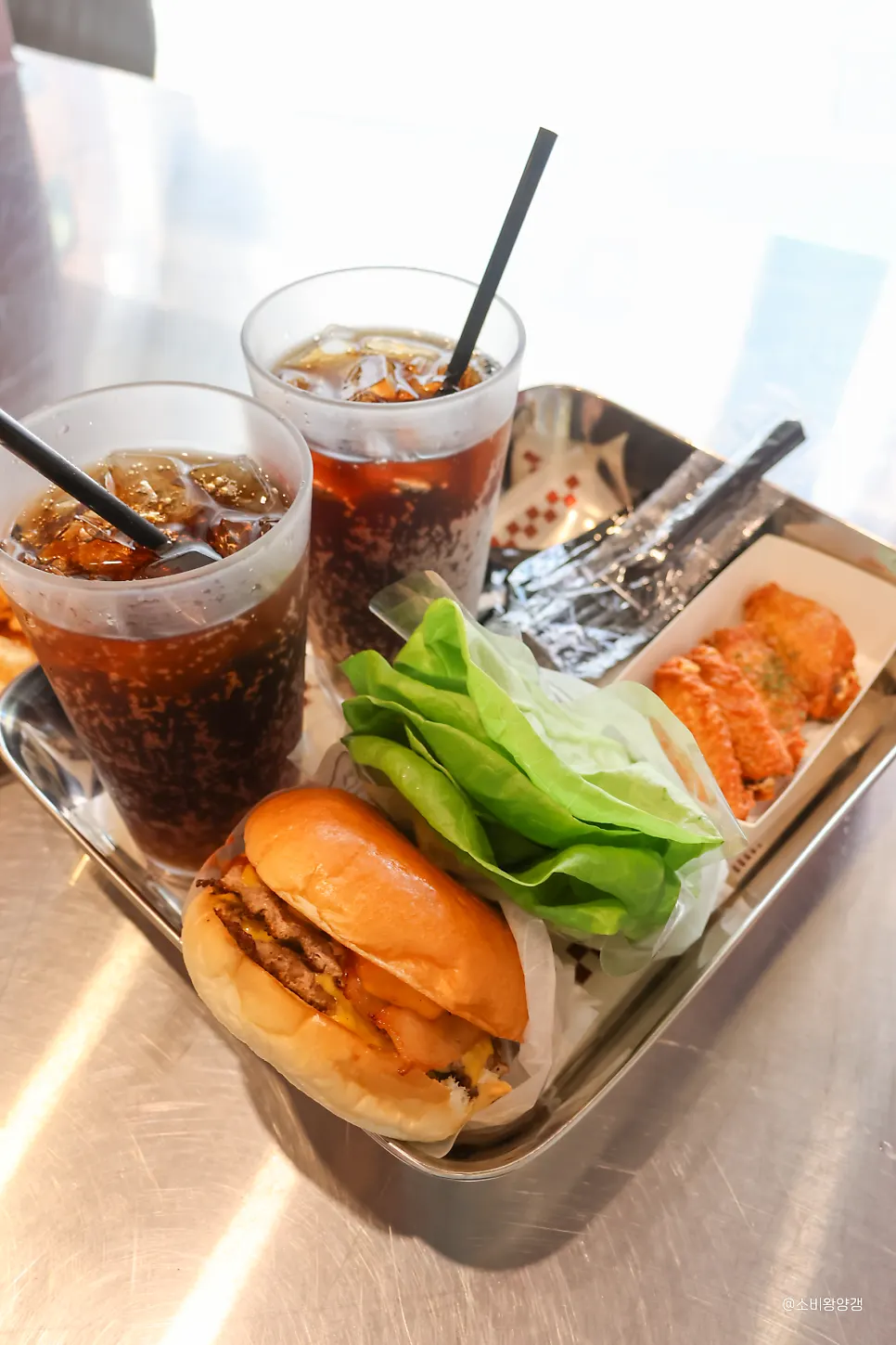 A Bas Burger showing the patty and cheese