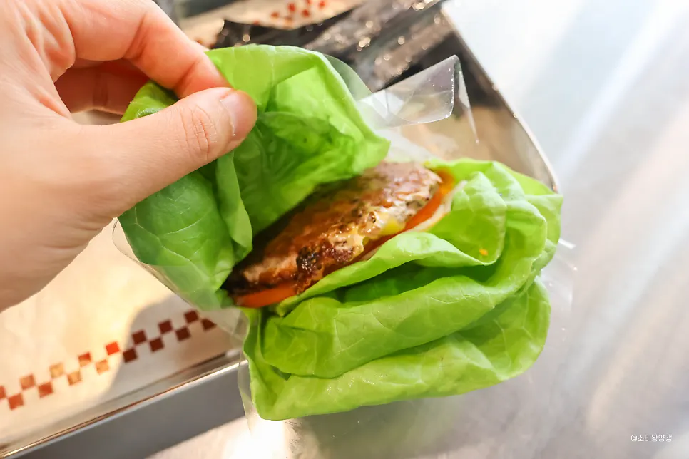 A Bas Burger customized with extra toppings