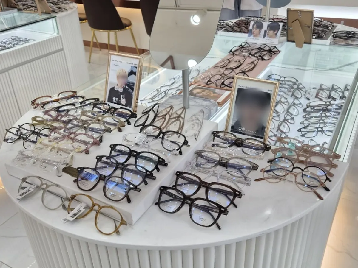 Wall filled with rows of eyeglass frames