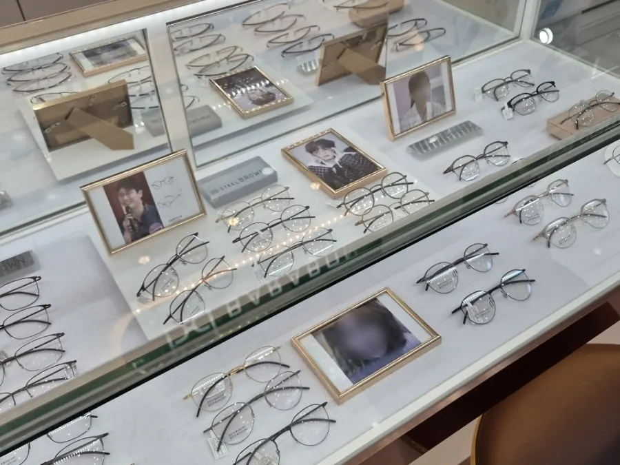Store display corner with hanging sunglasses