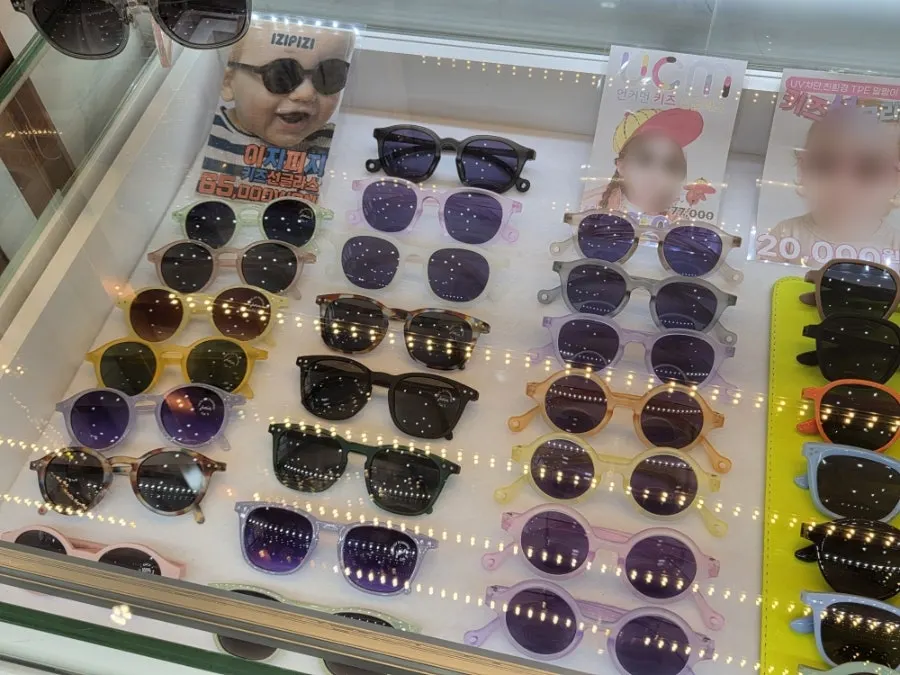 Baby sunglasses arranged by color