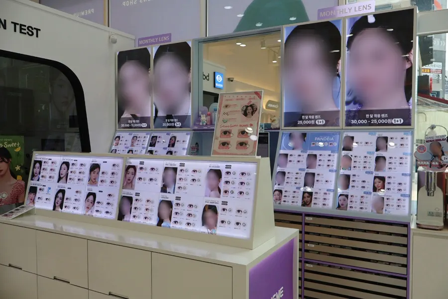 Store interior with glasses and contact lenses displayed separately