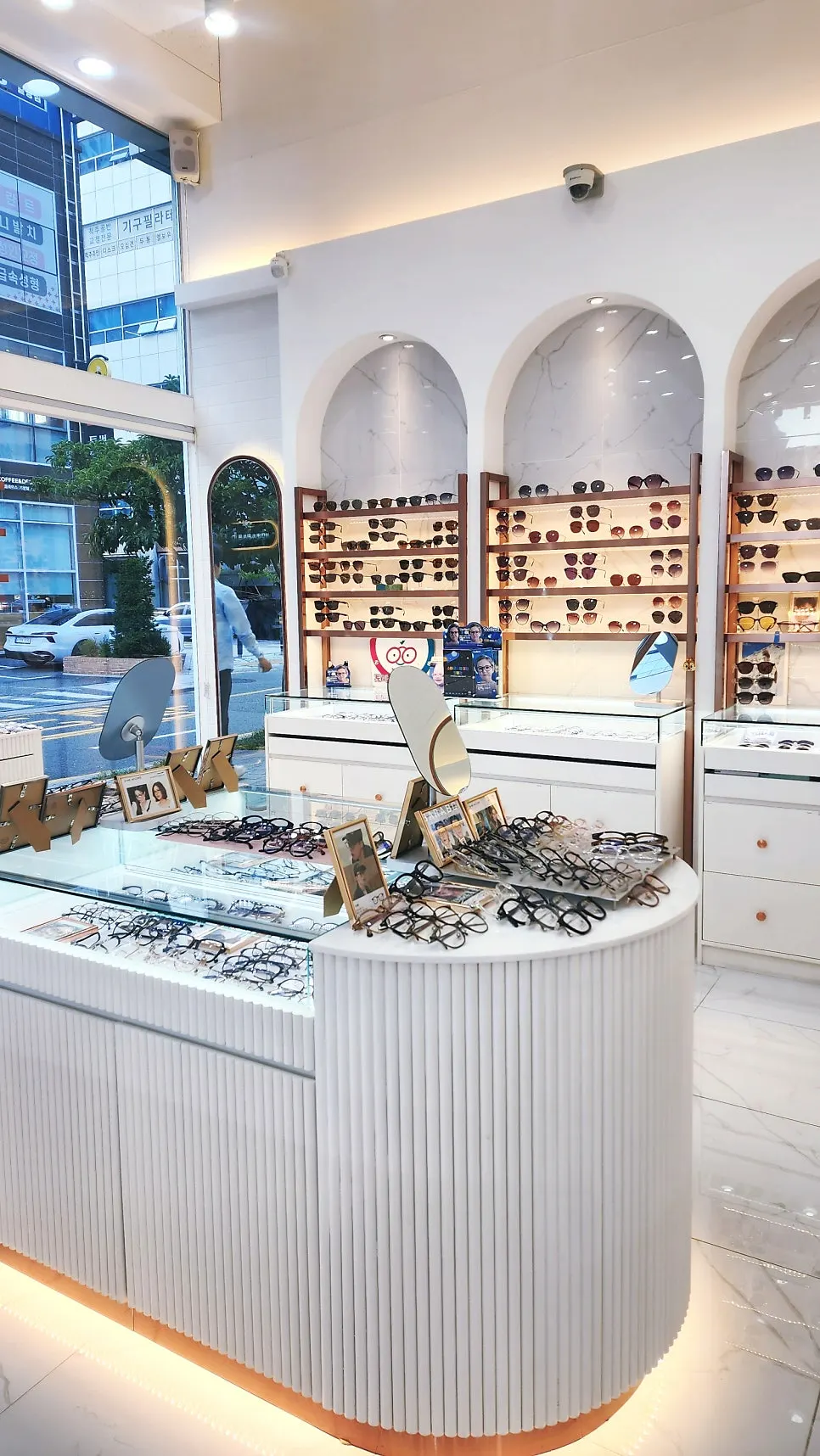White-toned interior of the optical shop