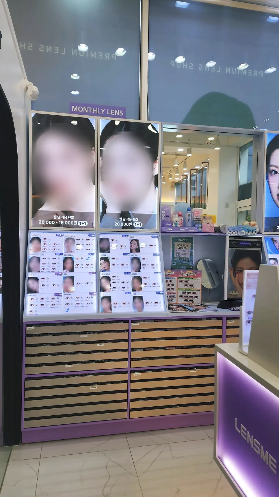 Wall display of Lens Me contact lenses