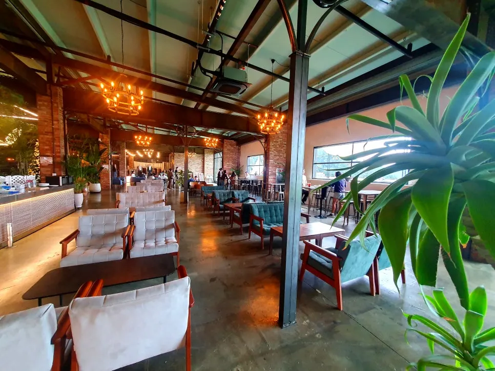 1st floor seating with sofas and generously sized tables