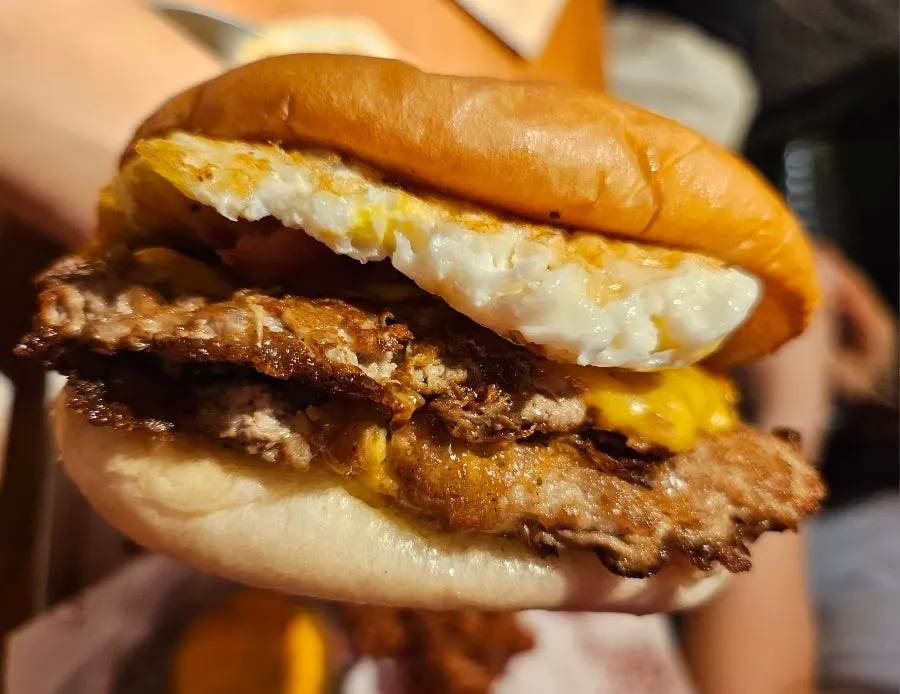 Double bacon cheese burger set served on the table