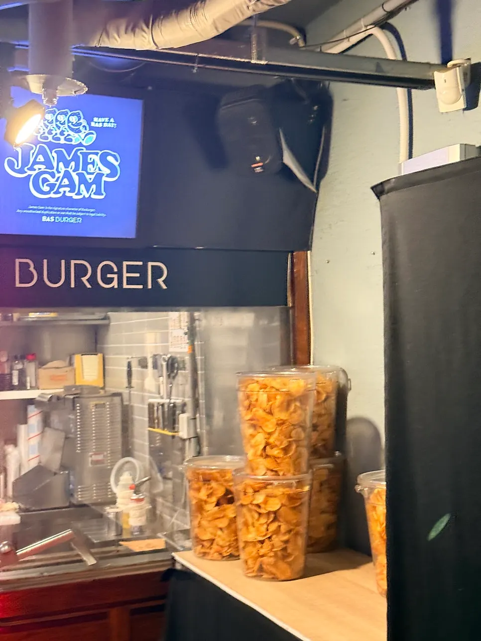Eating chips while waiting for the burger