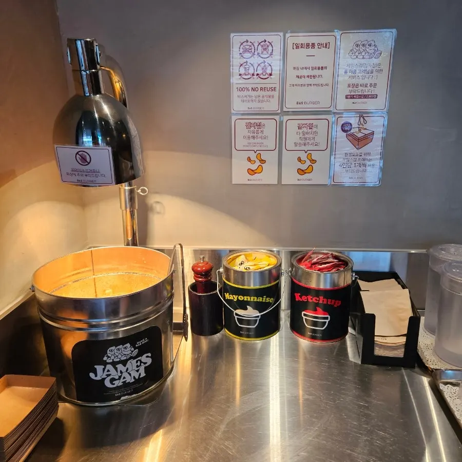 Self-serve bar with unlimited potato chip refills in a large container