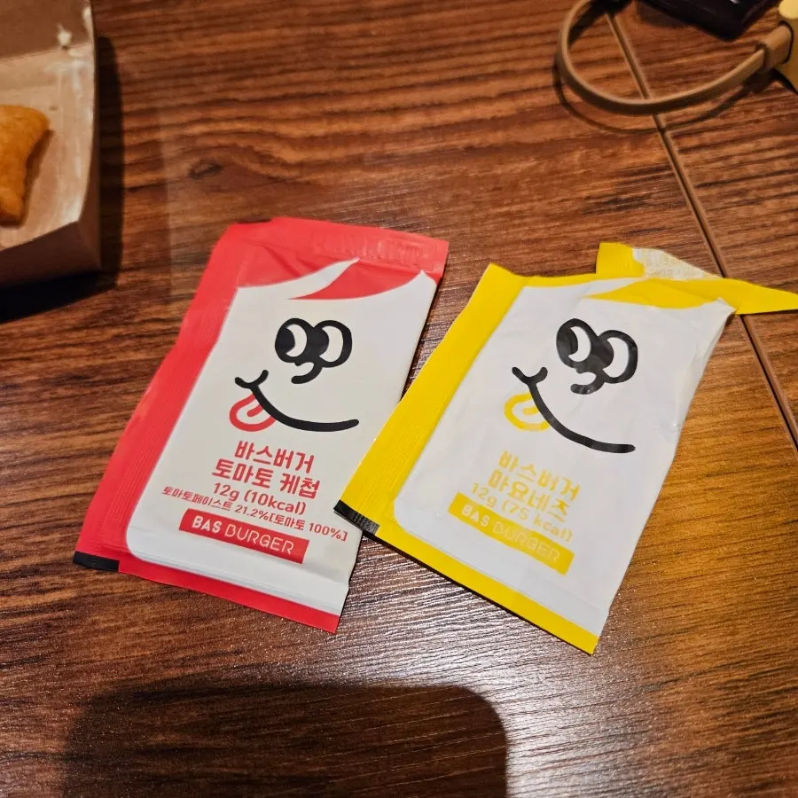 Self-serve tomato ketchup and mayonnaise sauces