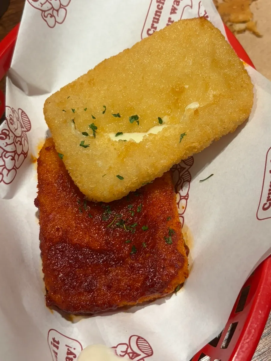 Plate of Base Burger's chilli mozzarella cheese bar