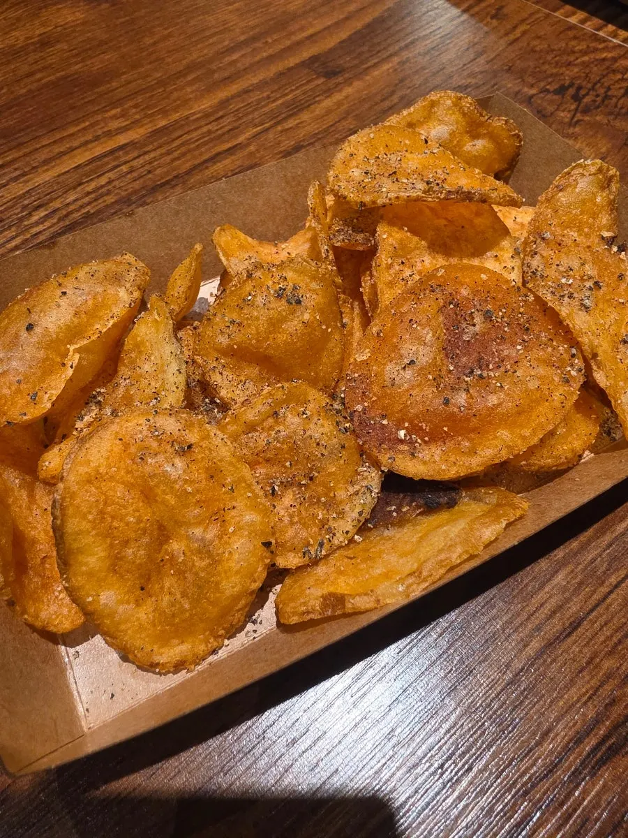 Potato chips scooped from the self-serve bar
