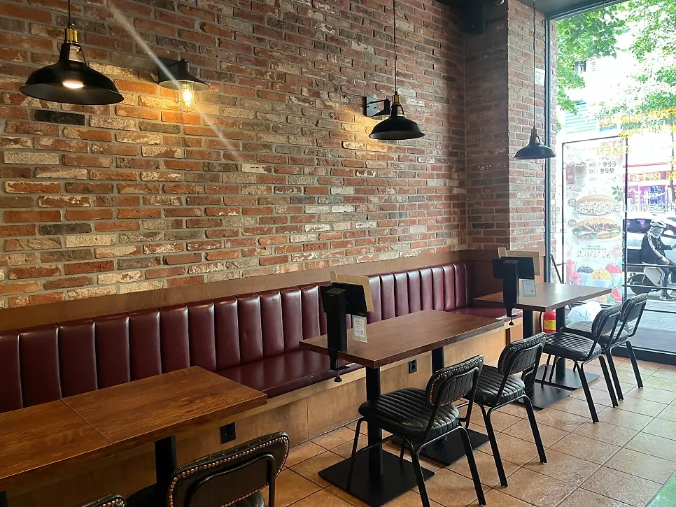 Bas Burger dining space with soft ambient lighting