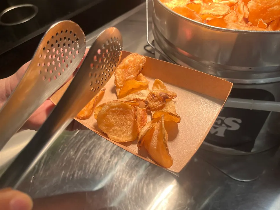 Crispy house-made potato chips in a basket