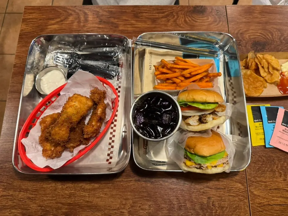 Wasabi mayo shrimp burger and double Bas burger served together