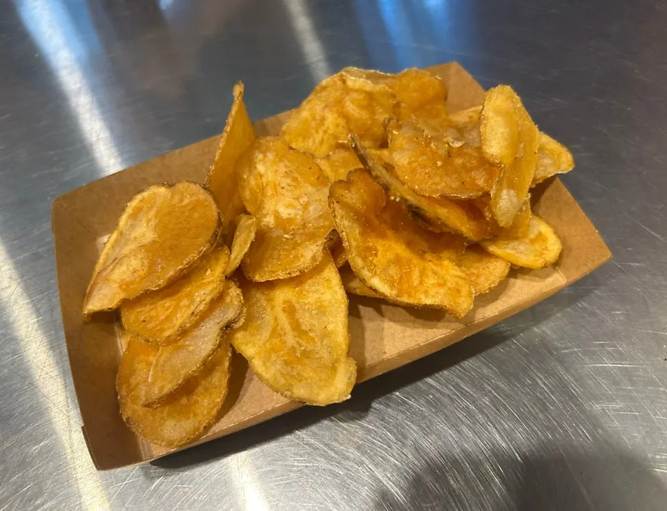 James Gam potato chips brought over on a tray